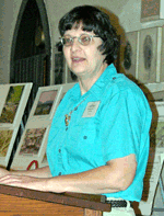 Carol Ebright conducts the business meeting
