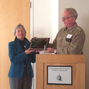 Louise Ackerson accepts the William B. Marye award from Tyler Bastian