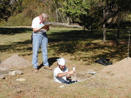 Members record the details of an excavation unit